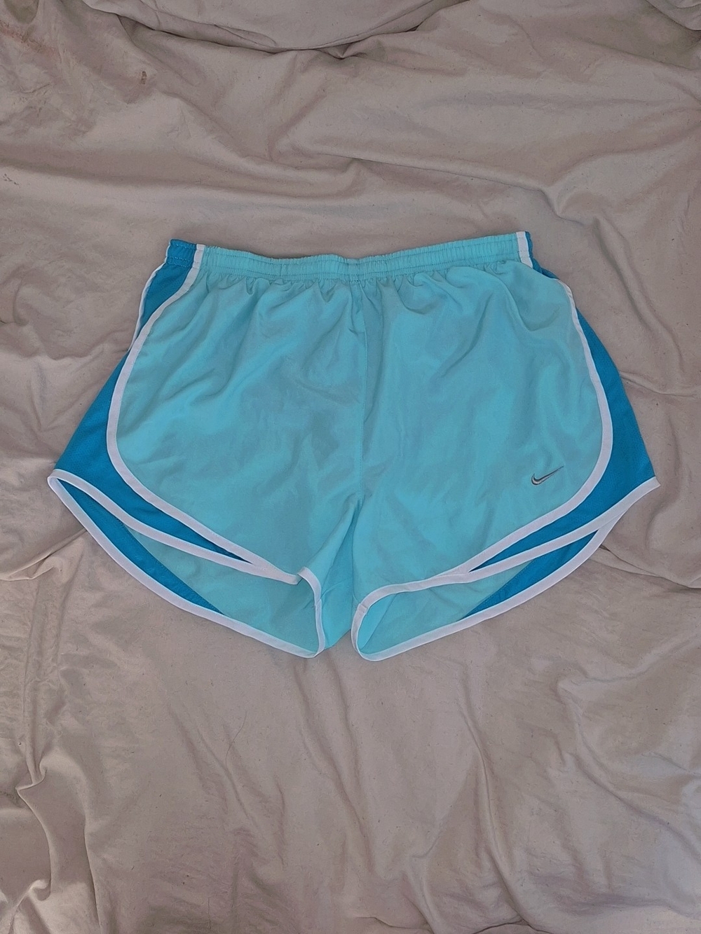Nike Women’s Light Aqua Running Shorts with Teal Side Panels